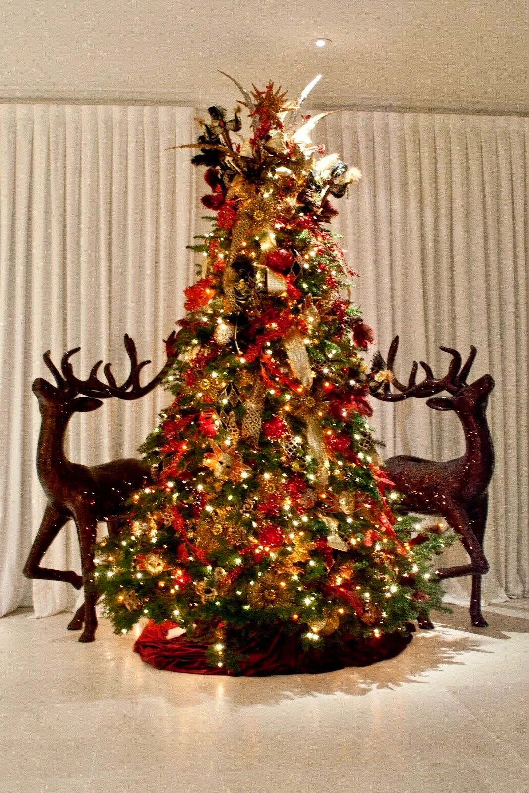 Decorated tree and reindeer in a home interior