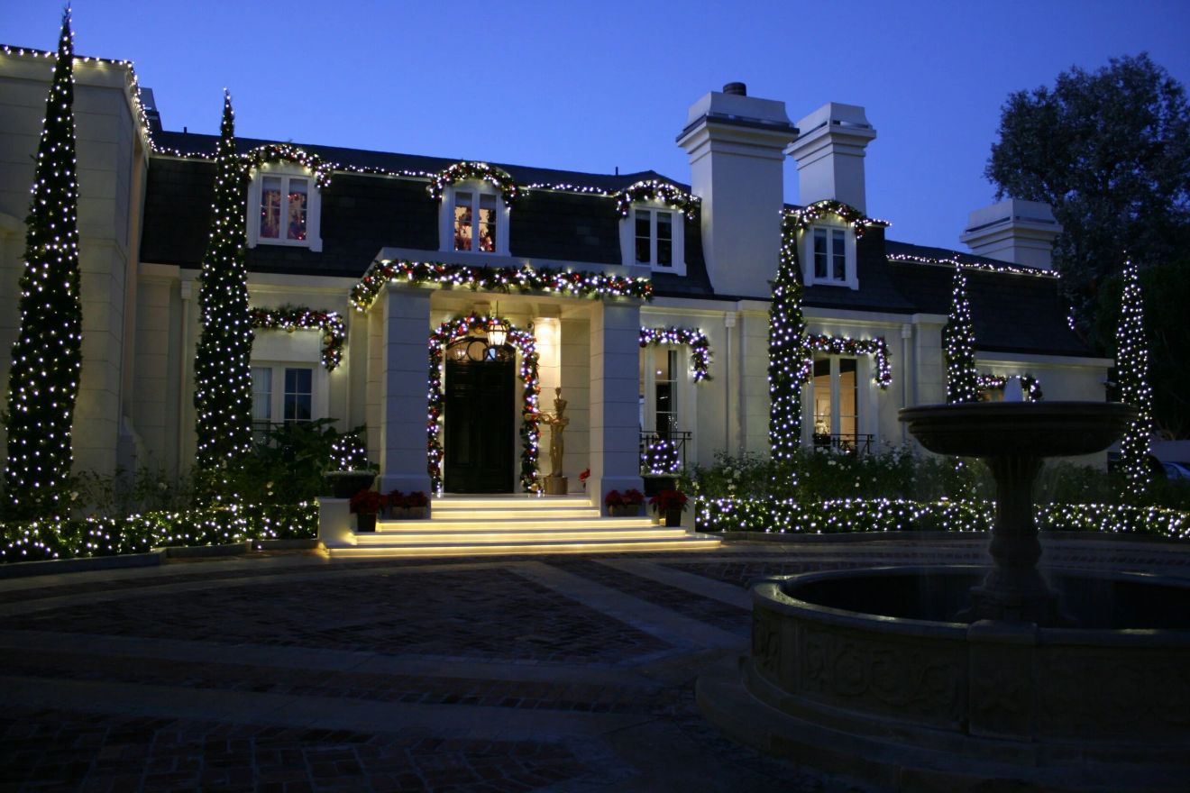 Home exterior lit at dusk
